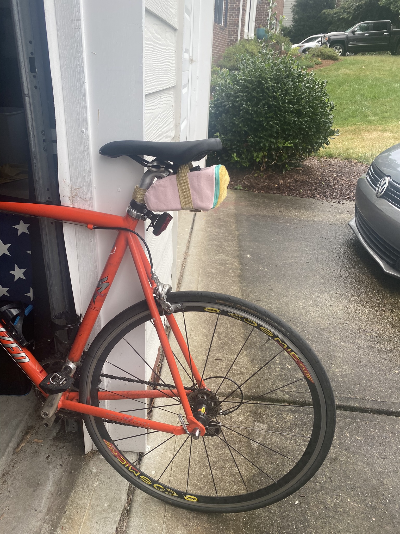 Impractical Saddle Bag made from light pastel canvas and faux fur. Comically designed for sunny, dry rides only!